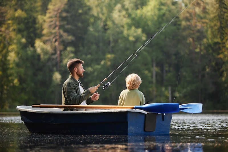 Family fishing from a small boat